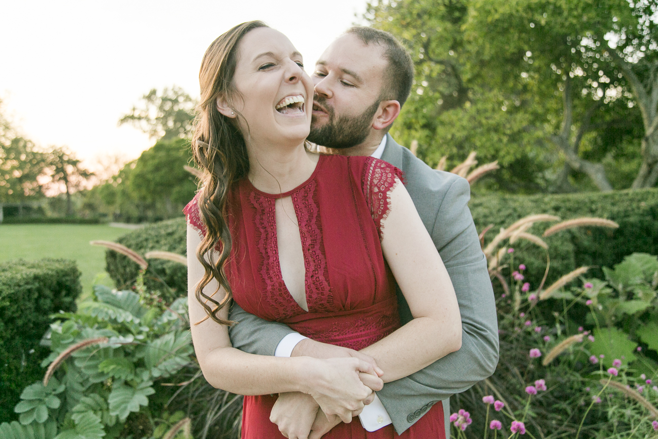 Fiance kissing his bride-to-be during an Engagement session in Ault Park Cincinnati Ohio