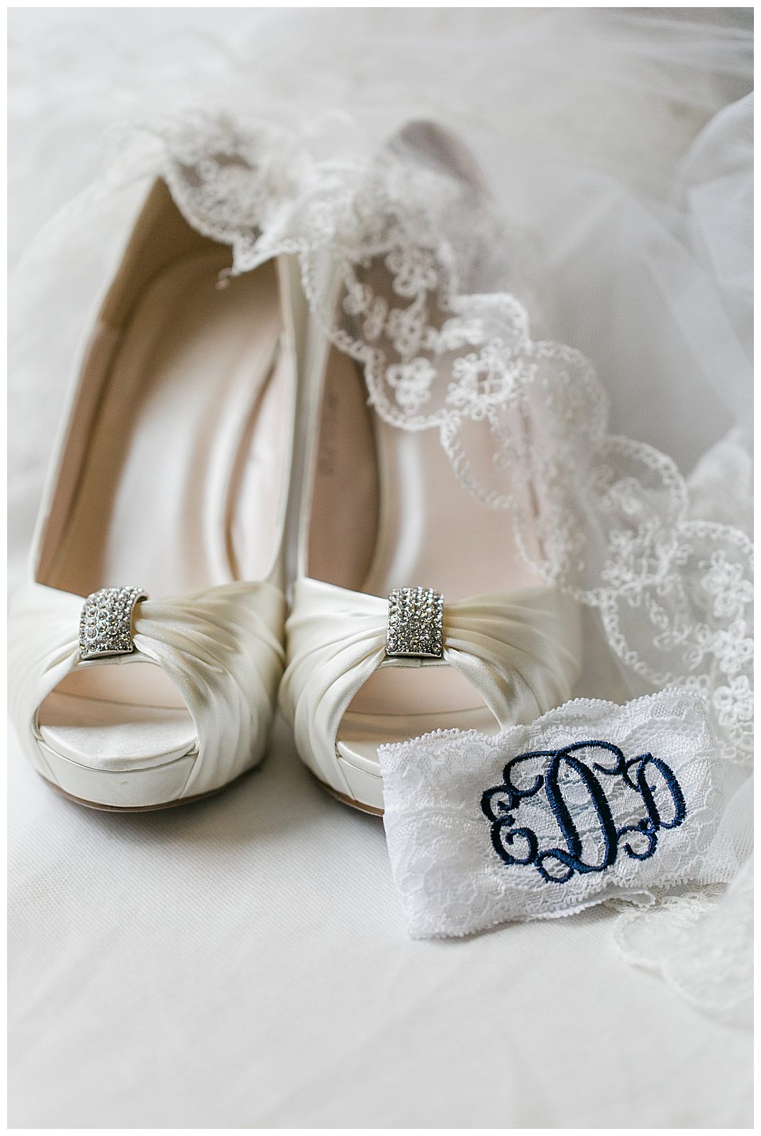 garter, veil, and shoes wedding day detail shot