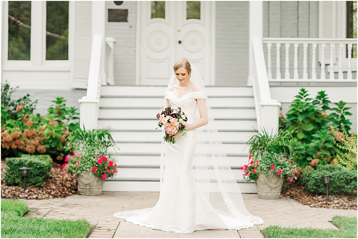 Bride in front of front door of McAlister - Leftwich House