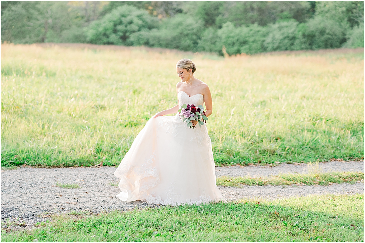 Bride walking down road at Summerfield Farms during Bridal Portraits session in North Carolina