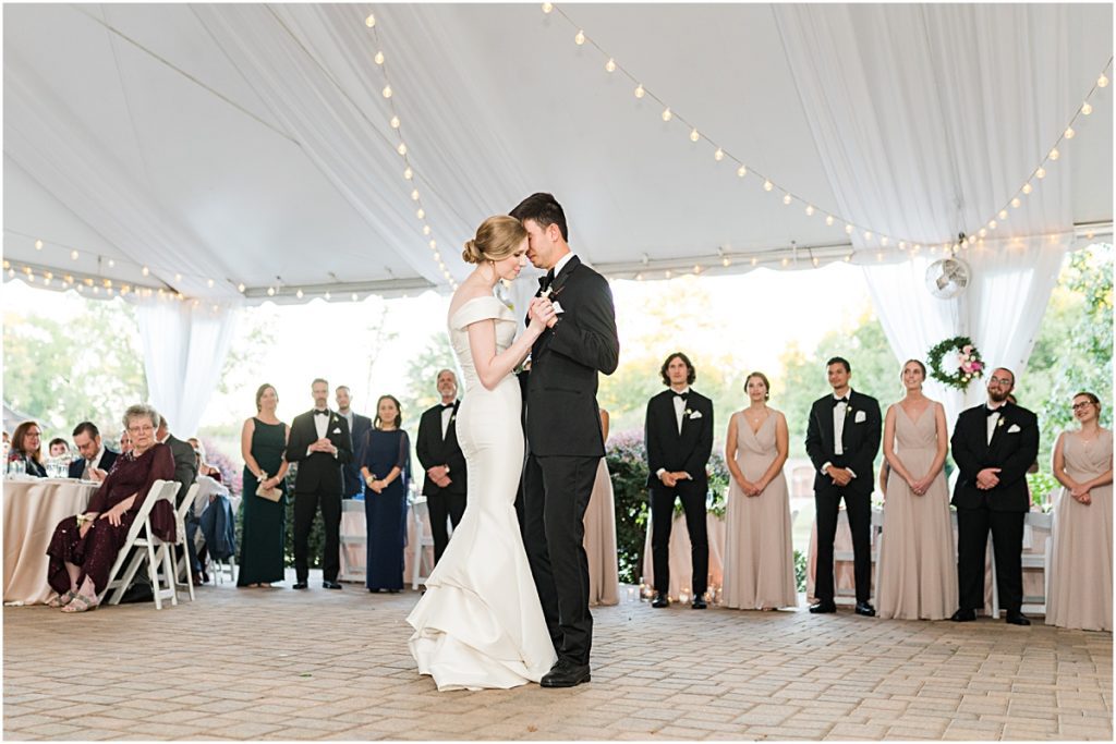 Bride and Groom dancing, enjoying the day is one of the important wedding day tips