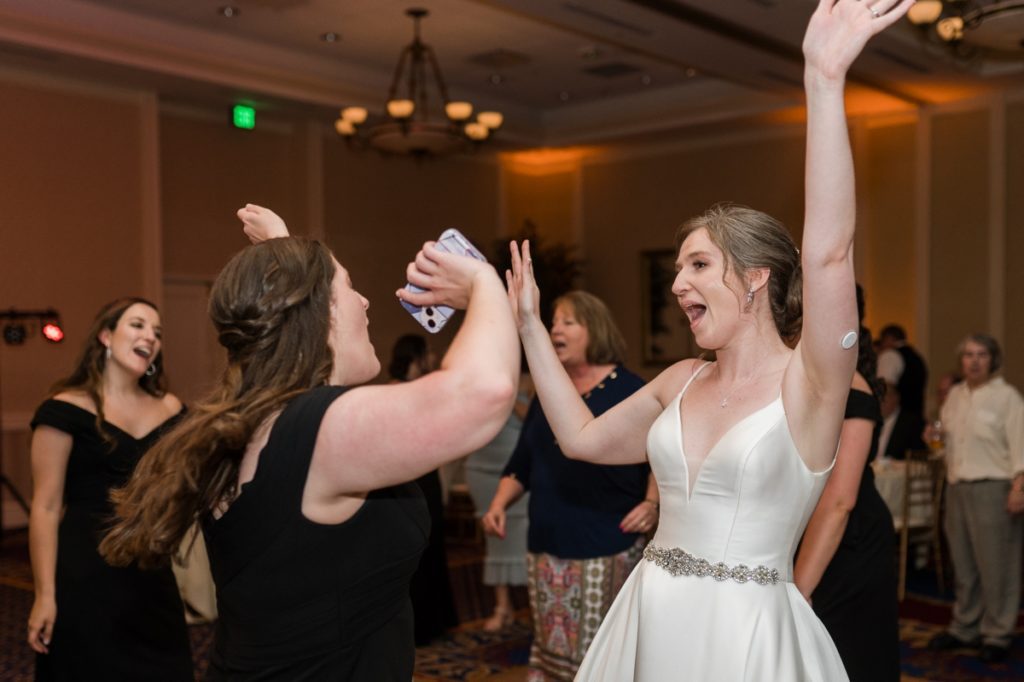 Haley dancing with her wedding guests during her reception during their Wedding in Raleigh NC