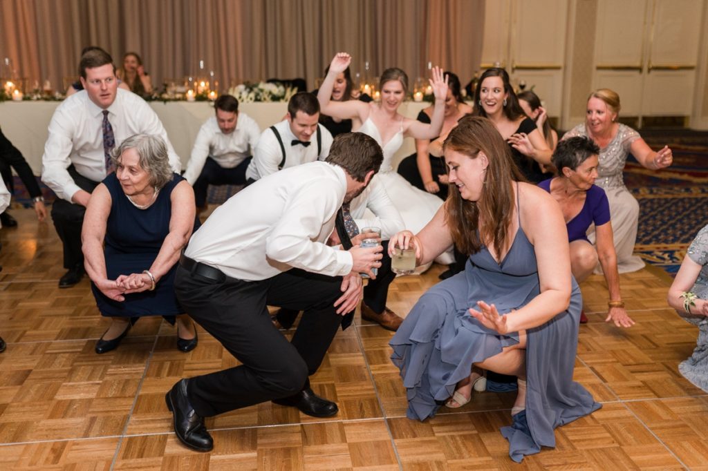 Haley and Matt dropping it low with their wedding guests during their wedding at Washington Duke Inn and Golf Club during their Wedding in Raleigh NC