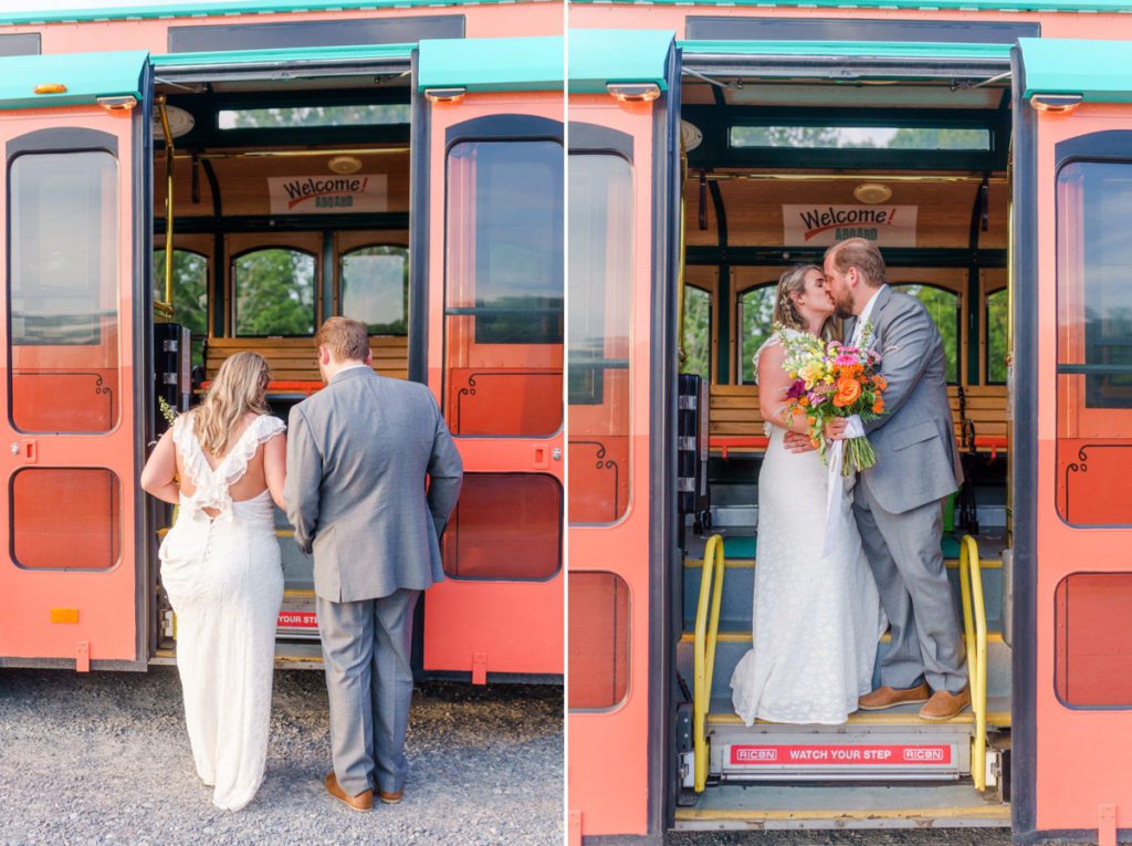 The bride and groom stepping onto the trolley and kissing on the stairs at their wedding.