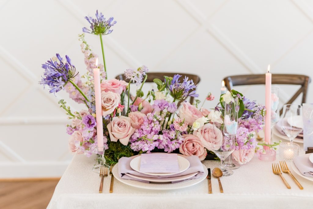 Pastel pink and purple floral and table decorations designed by Amanda K Events.