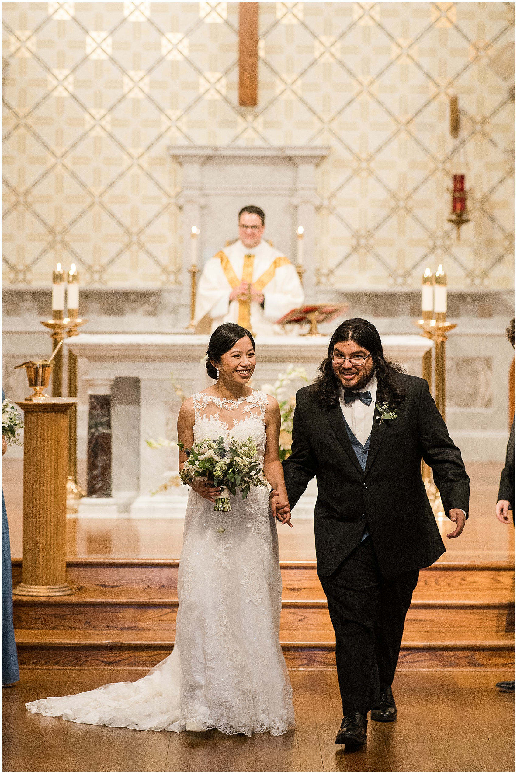 bride and groom walking down the aisle at their church ceremony