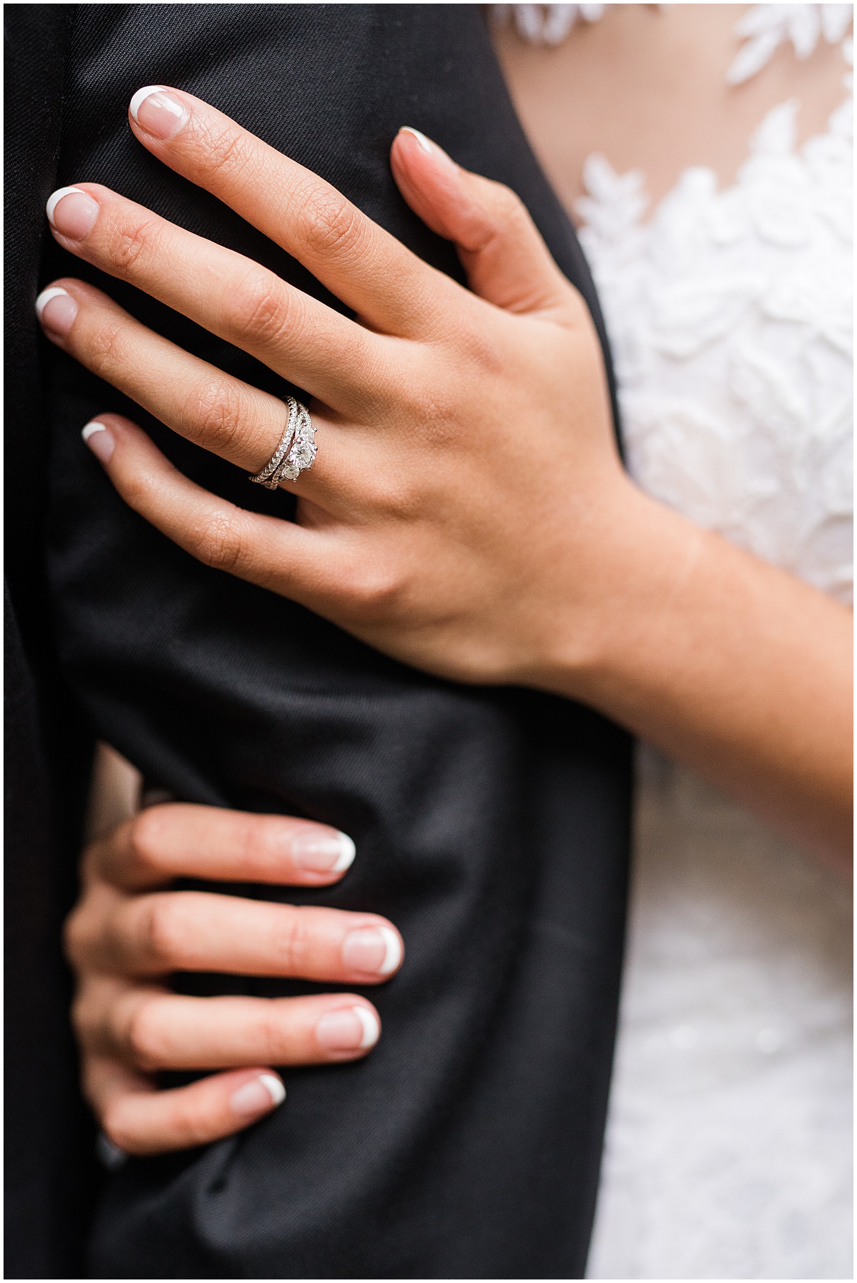 closeup of a wedding ring on a bride's hand